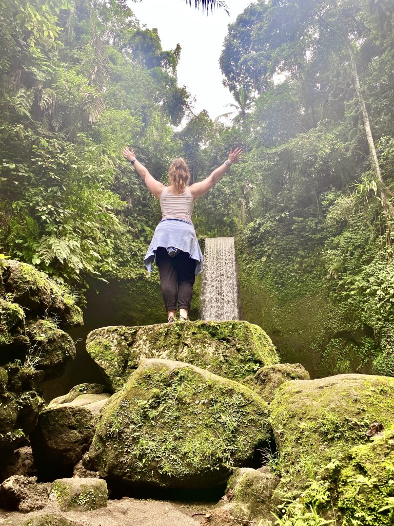 Arms wide, fully alive, this is what your Bali adventure days feel like.